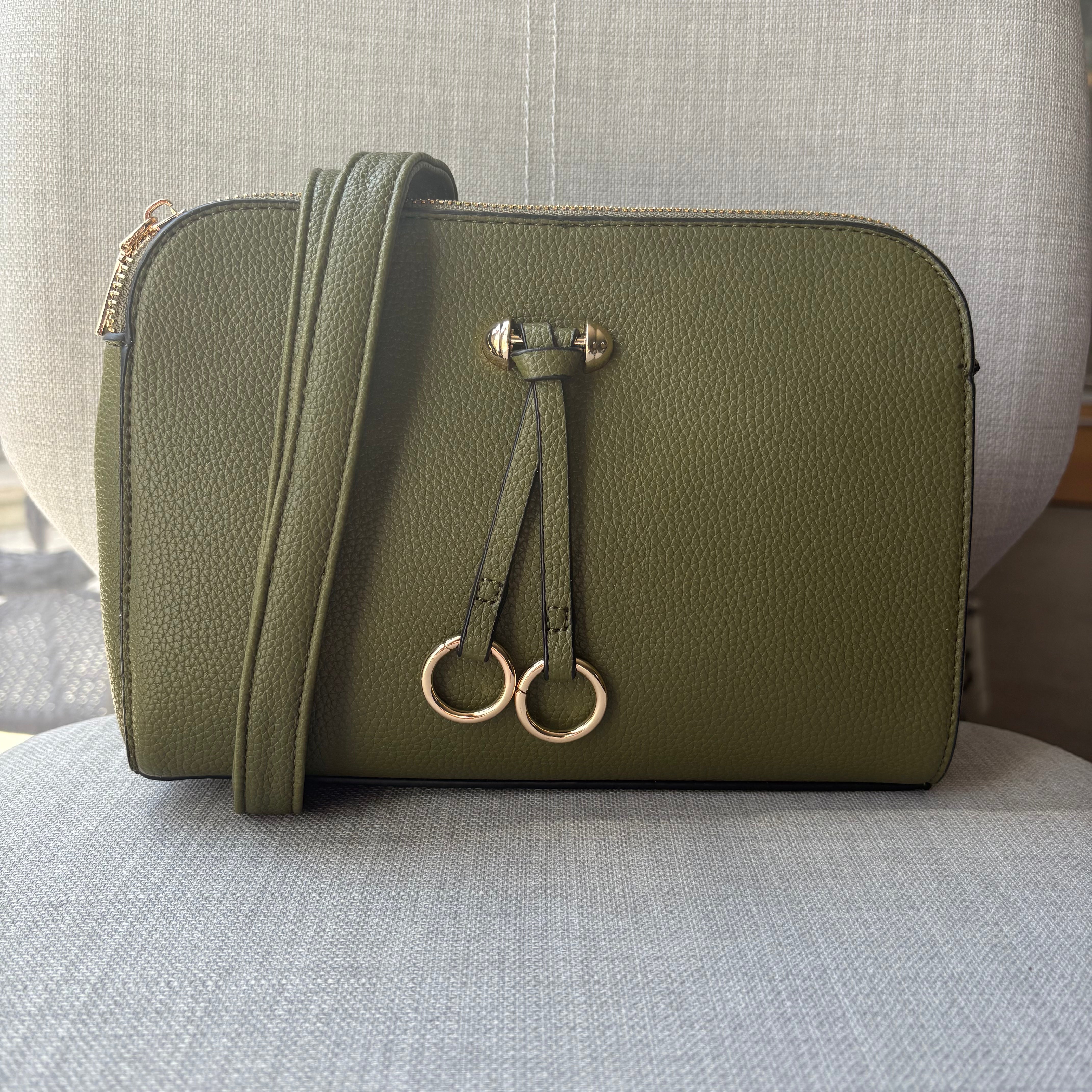 Two ring drop, three pocket crossbody bag - with matching shoulder strap - made from recycled materials