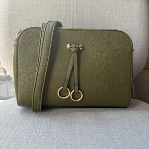 Two ring drop, three pocket crossbody bag - with matching shoulder strap - made from recycled materials
