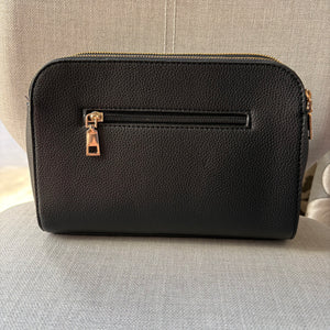 Two ring drop, three pocket crossbody bag - with matching shoulder strap - made from recycled materials