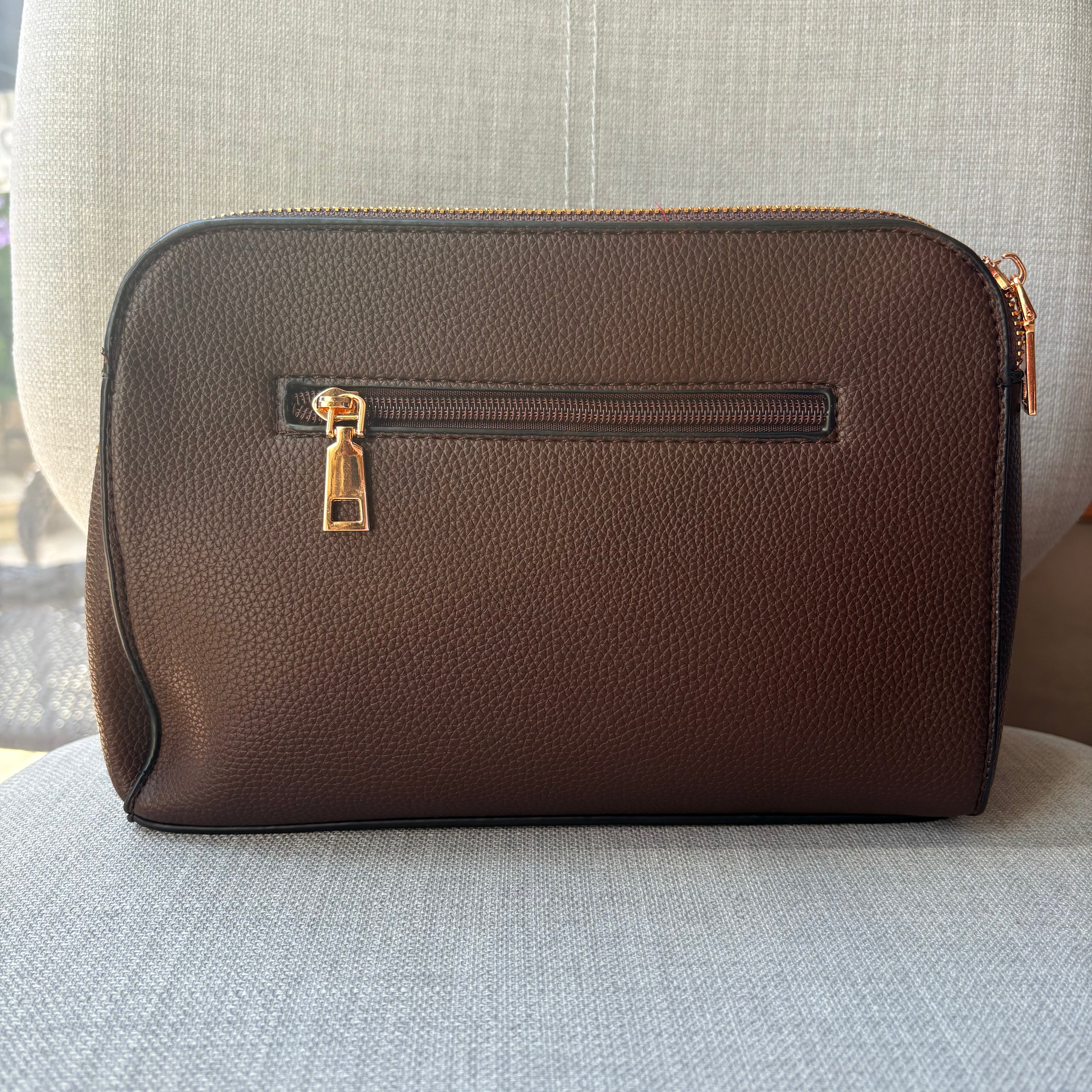 Two ring drop, three pocket crossbody bag - with matching shoulder strap - made from recycled materials
