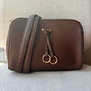 Two ring drop, three pocket crossbody bag - with matching shoulder strap - made from recycled materials
