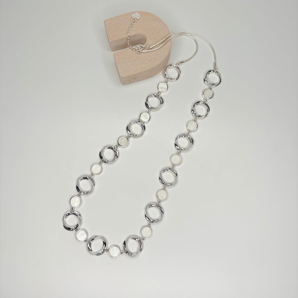 Long silver necklace, with mother of pearl circular stations