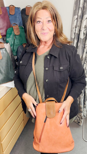 Navy backpack / cross body bag - made from recycled water bottles - looks just like leather!