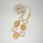 Long light oak necklace, with wooden circular stations
