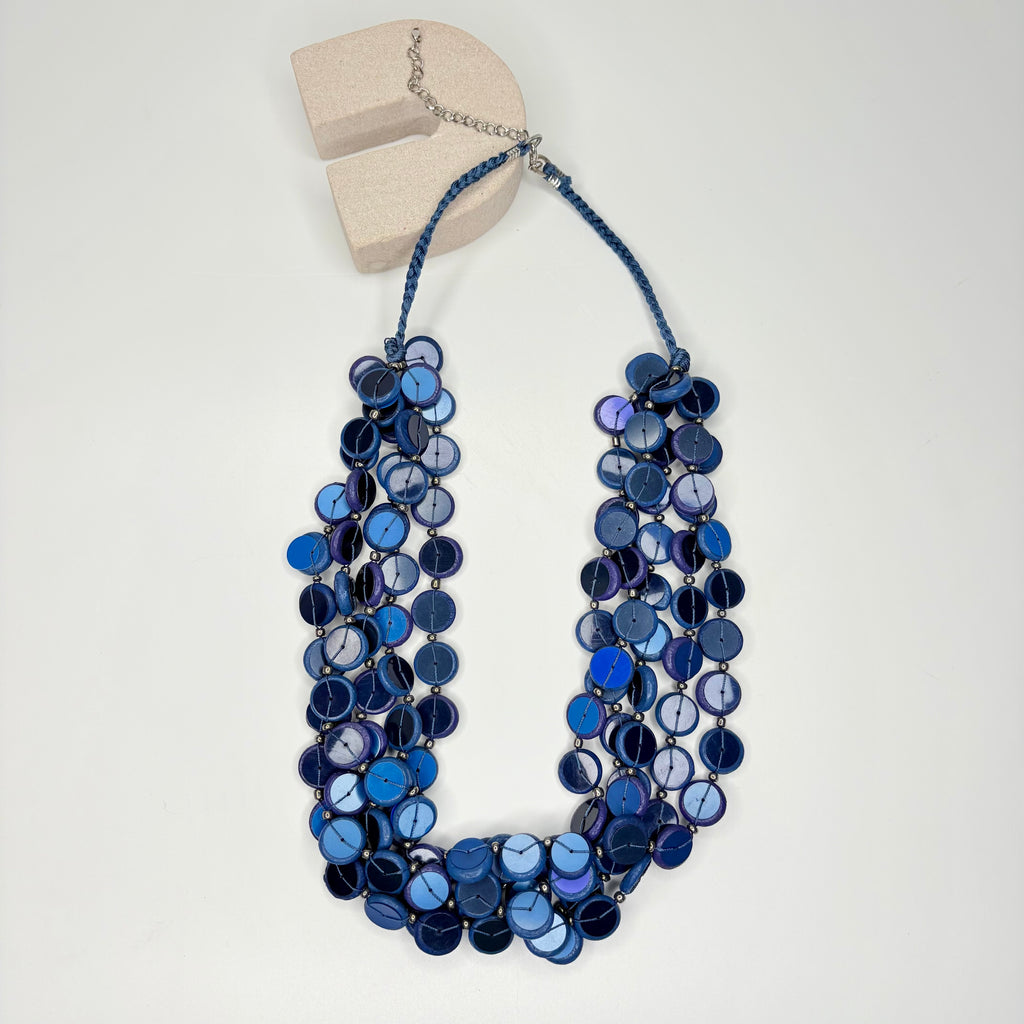 Short navy blue necklace, with multi-row blue circular stations