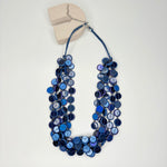 Short navy blue necklace, with multi-row blue circular stations