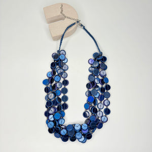 Short navy blue necklace, with multi-row blue circular stations
