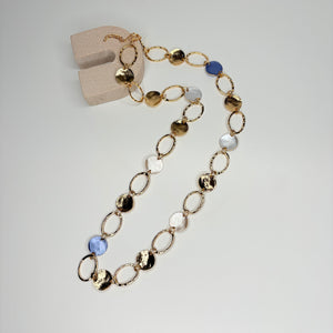 Long gold necklace, with blue and silver links