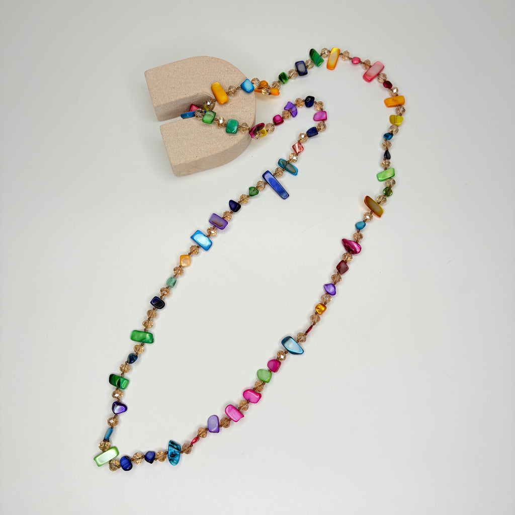Long necklace, with tinted multi-colour natural shell stations