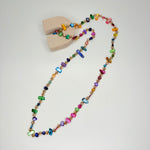 Long necklace, with tinted multi-colour natural shell stations
