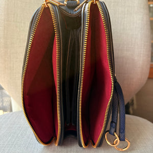 Two ring drop, three pocket crossbody bag - with matching shoulder strap - made from recycled materials