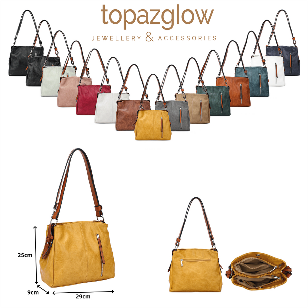 Cross body handbag - two zip compartments, front and back zip - made from recycled materials