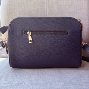 Two ring drop, three pocket crossbody bag - with matching shoulder strap - made from recycled materials