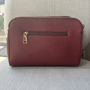 Two ring drop, three pocket crossbody bag - with matching shoulder strap - made from recycled materials