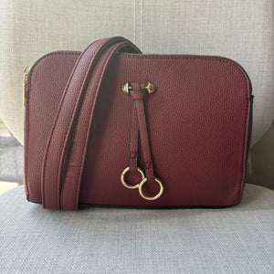 Two ring drop, three pocket crossbody bag - with matching shoulder strap - made from recycled materials