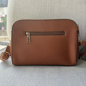 Two ring drop, three pocket crossbody bag - with matching shoulder strap - made from recycled materials