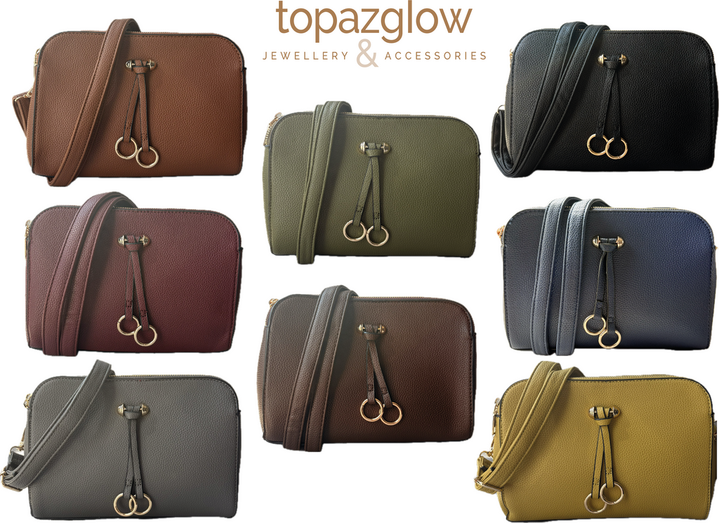 Two ring drop, three pocket crossbody bag - with matching shoulder strap - made from recycled materials