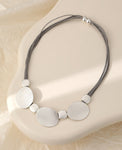 Short magnetic necklace, with silver round stations