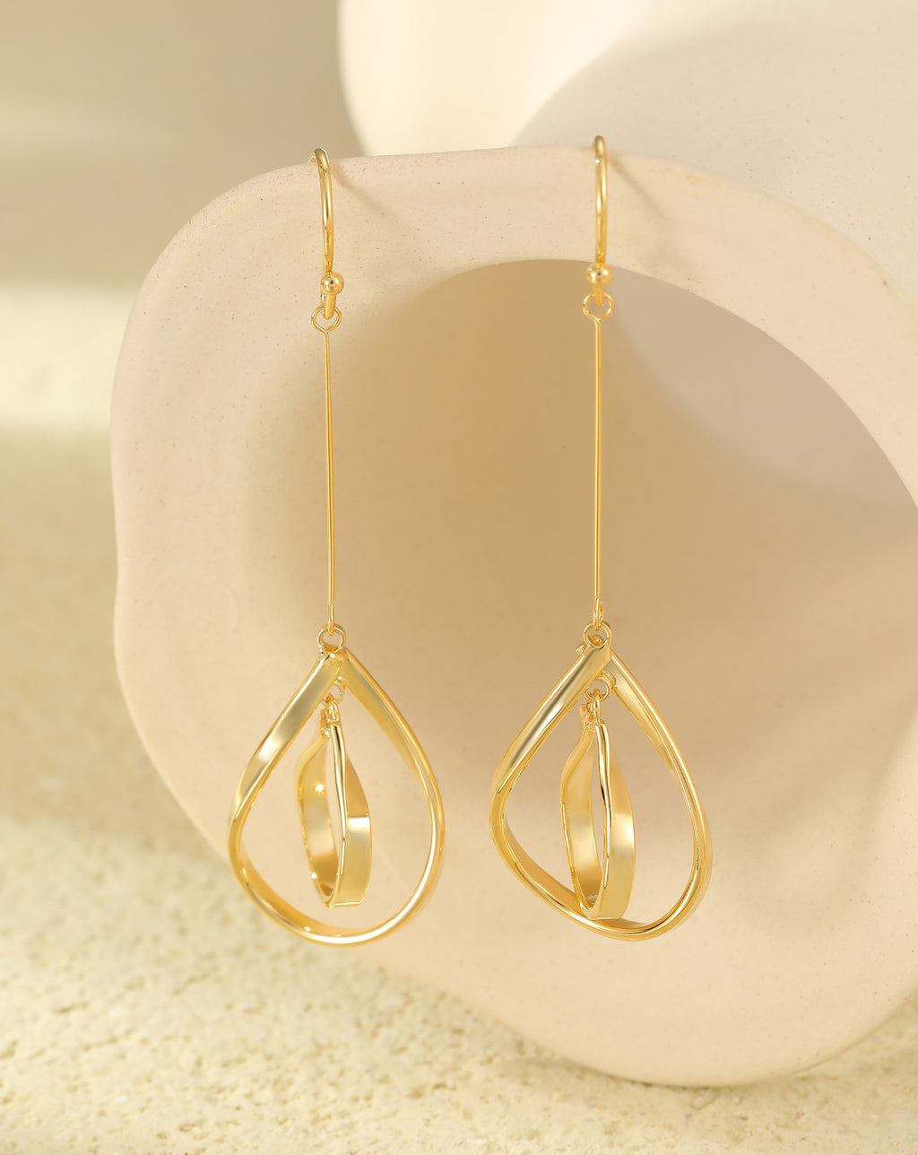 Gold double teardrop drop earrings