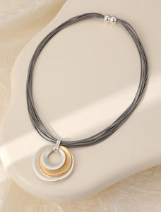 Short silver & gold magnetic necklace, with matte circular pendant