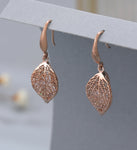 Rose gold caged crystal leaf earrings