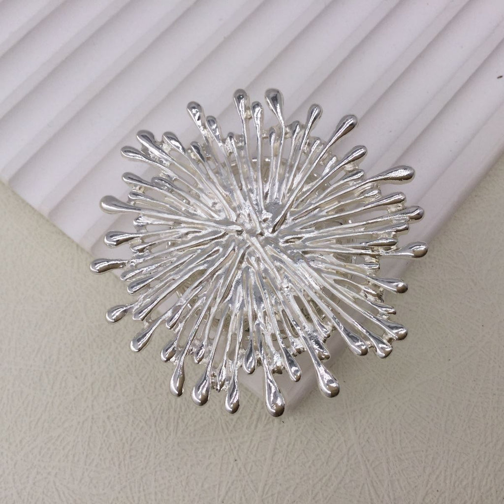Silver starburst magnetic brooch and scarf clip