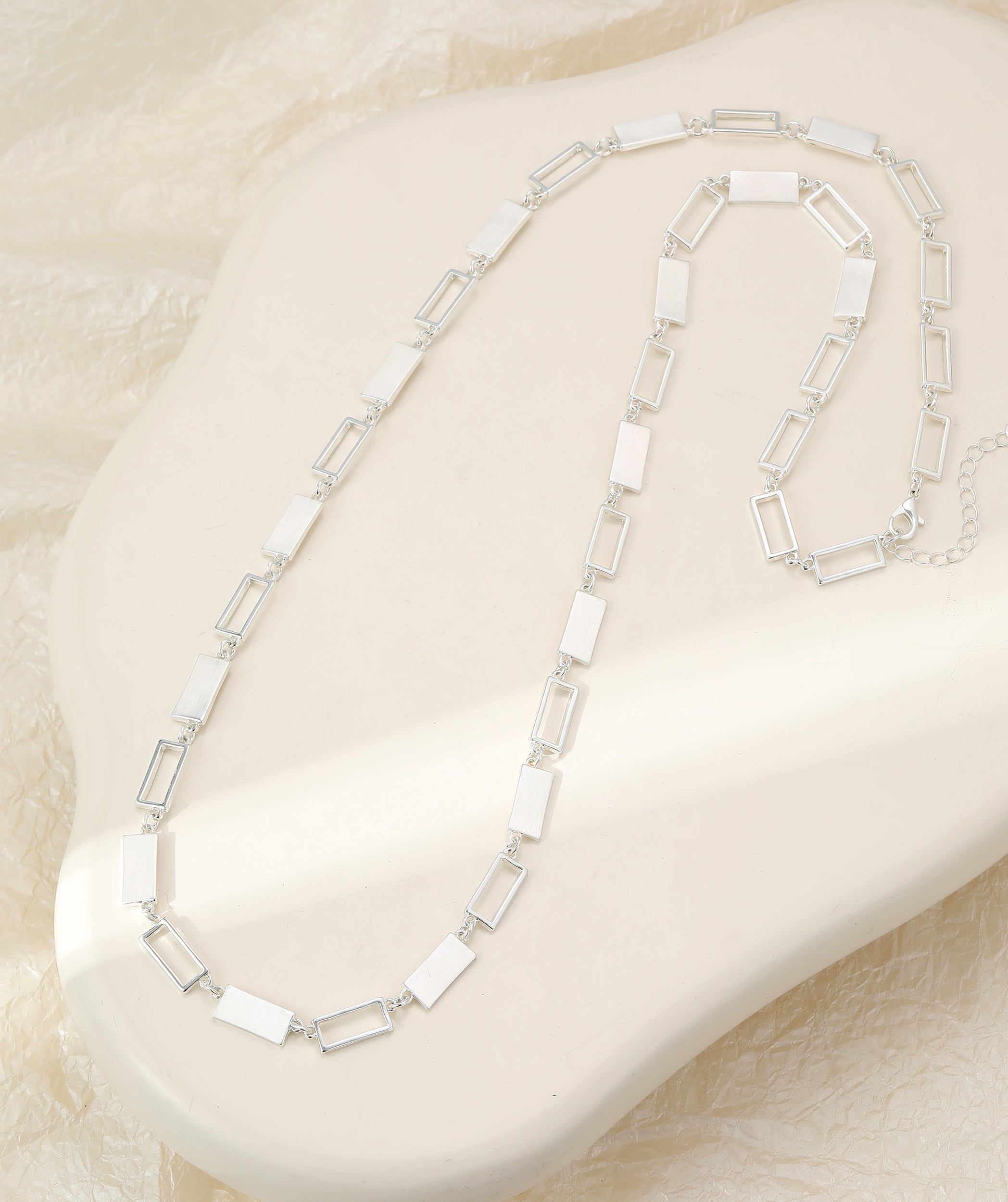 Long silver necklace, with rectangular stations