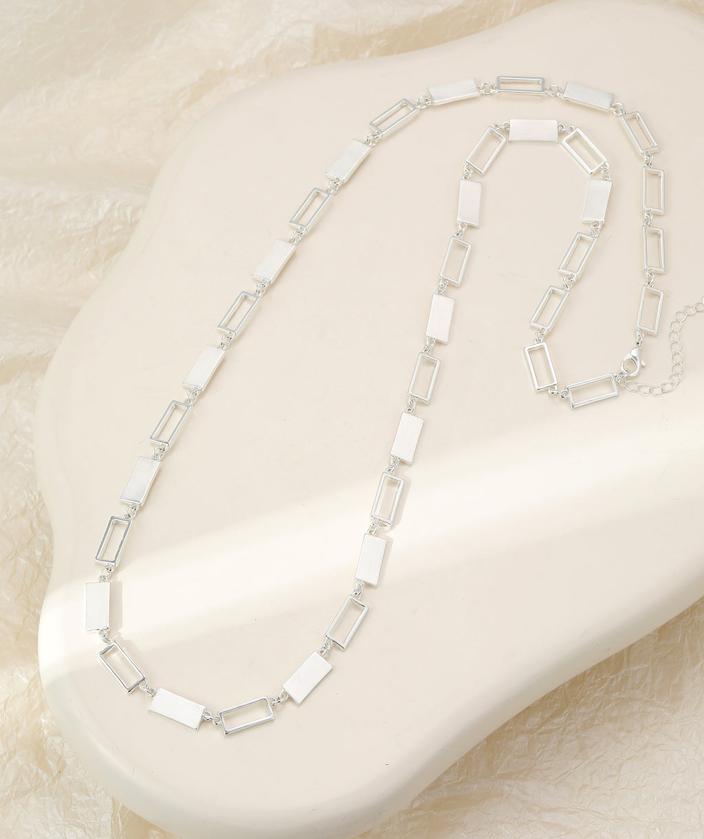 Long silver necklace, with rectangular stations