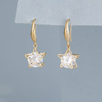 Gold & shiny crystal star drop earrings
