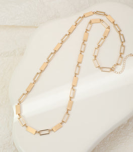 Long gold necklace, with rectangular stations