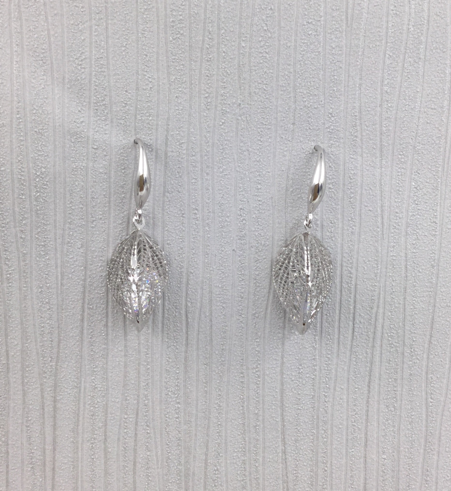 Silver caged crystal leaf earrings