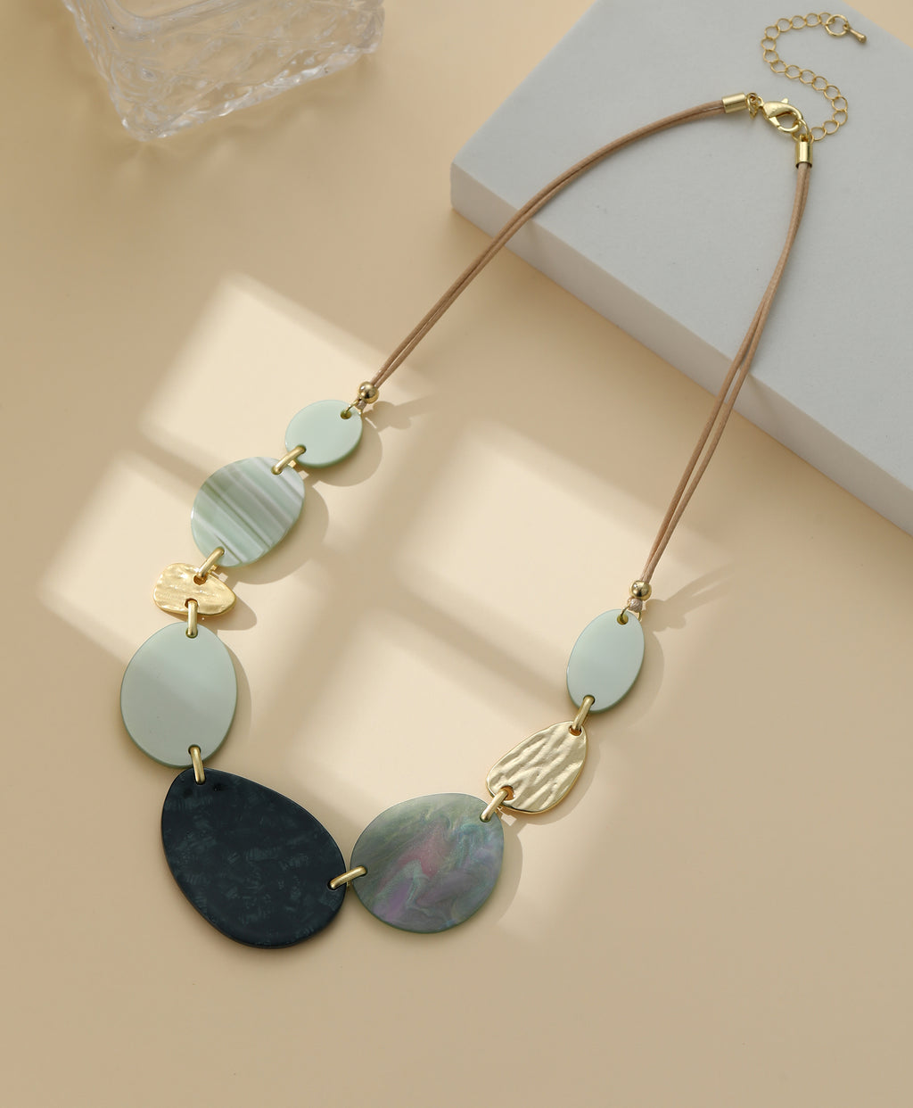 Short necklace, with gold & green shaded circular stations