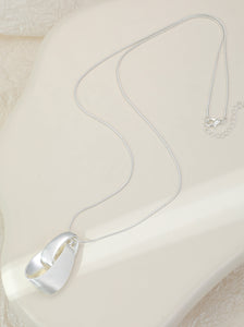 Long silver necklace, with knot design pendant