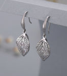Silver caged crystal leaf earrings