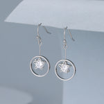 Silver circular crystal star drop earrings