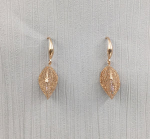 Rose gold caged crystal leaf earrings