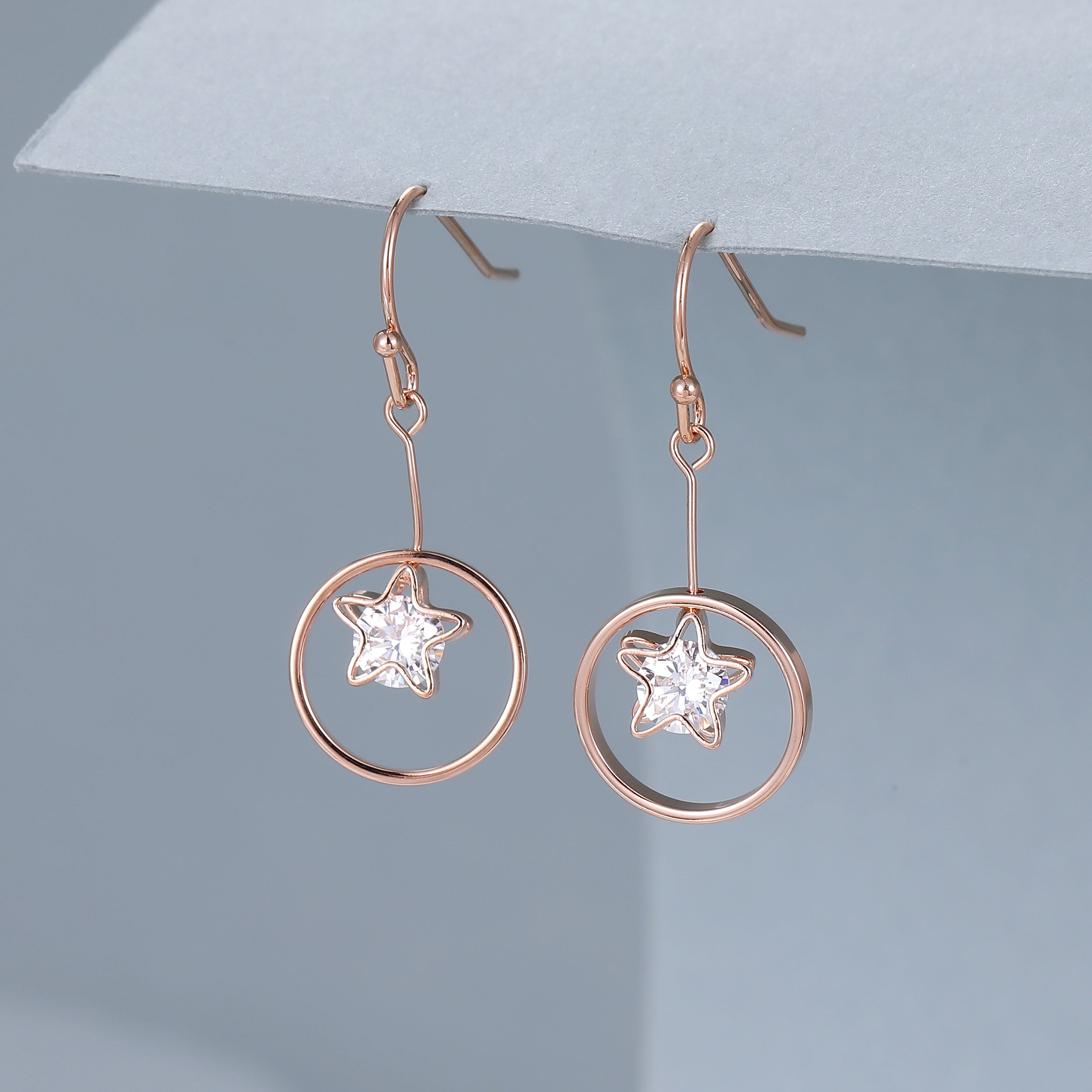 Rose gold circular crystal star drop earrings