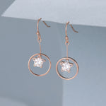 Rose gold circular crystal star drop earrings